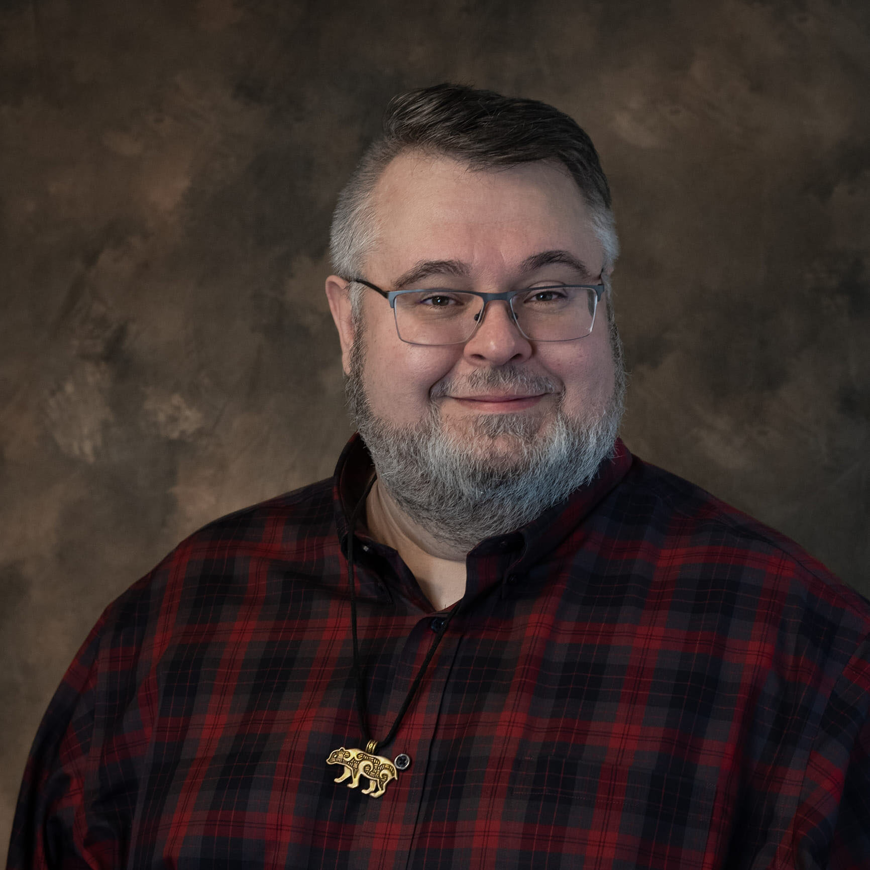 Headshot of Dr. CJ Robinson